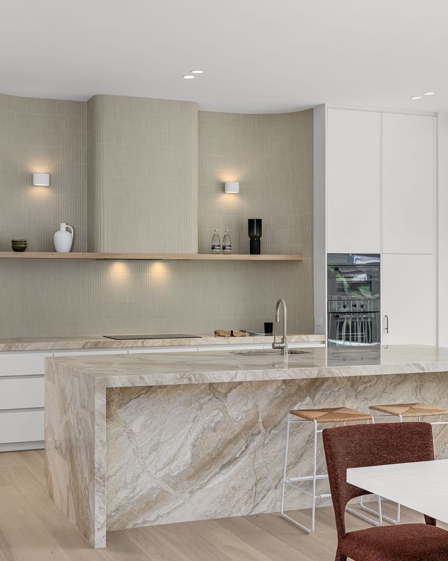 A Kitchen With Black Cabinets, White Counter Tops, a Sink and a Stove — Hot Rock Granite In Burleigh Heads, QLD