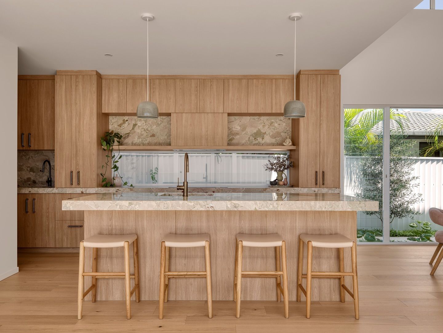A Restaurant With Tables and Chairs and a Bar — Hot Rock Granite In Burleigh Heads, QLD