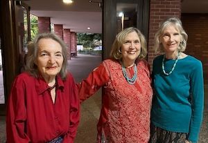 Cynthia standing with women