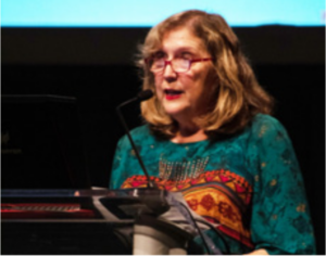 Cynthia Lukas speaking at an event