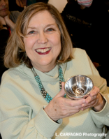 Cynthia Lukas accepting the 