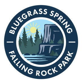 Bluegrass Spring Falling Rock Park circular logo with mountains, trees, sun, and river.