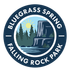 Bluegrass Spring Falling Rock Park circular logo with mountains, trees, sun, and river.