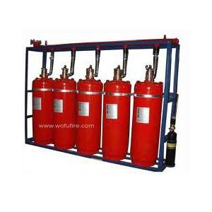 Red fire suppression cylinders in a blue metal frame manifold system