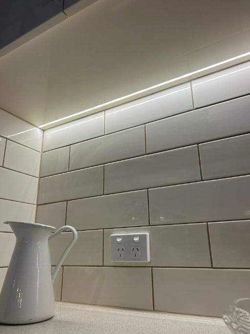 White Tiled Kitchen Backsplash — Fry Electrical In The Entrance, NSW