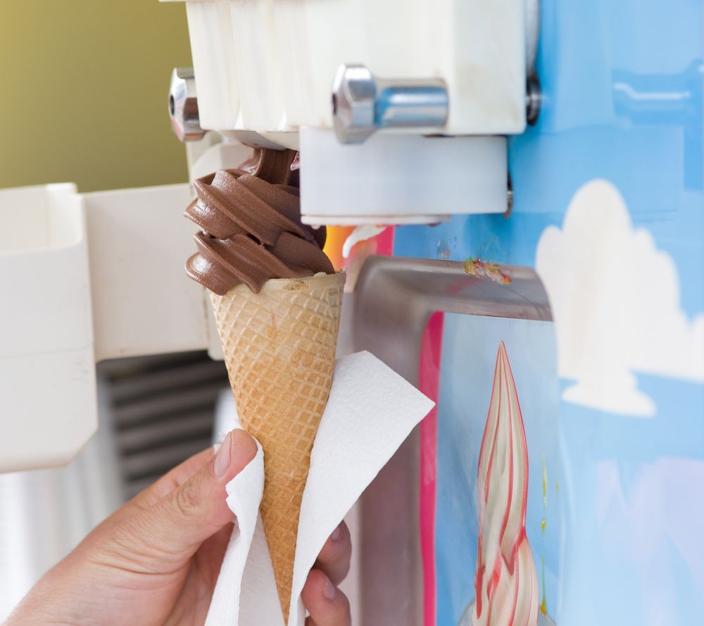 Happy Little Girl Eating Strawberry Ice Cream — Frosty Whip in Rasmussen, QLD