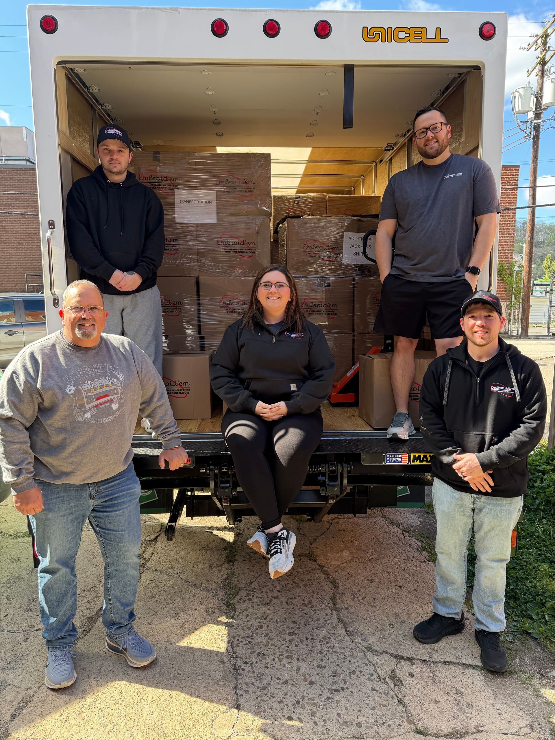 Embroid’em team in Waynesburg, PA, with a truckload of custom apparel produced for the 2026 NFL Draf