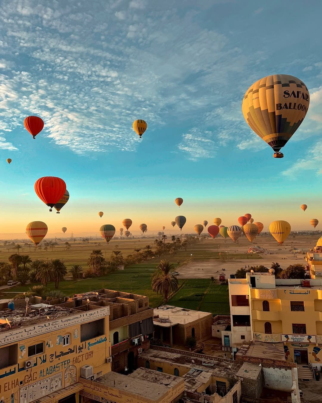 Sunrise colors over Luxor seen from a balloon