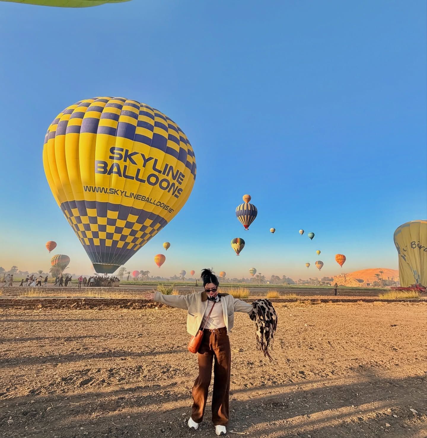 Guests enjoying a hot air balloon ride over Luxor
