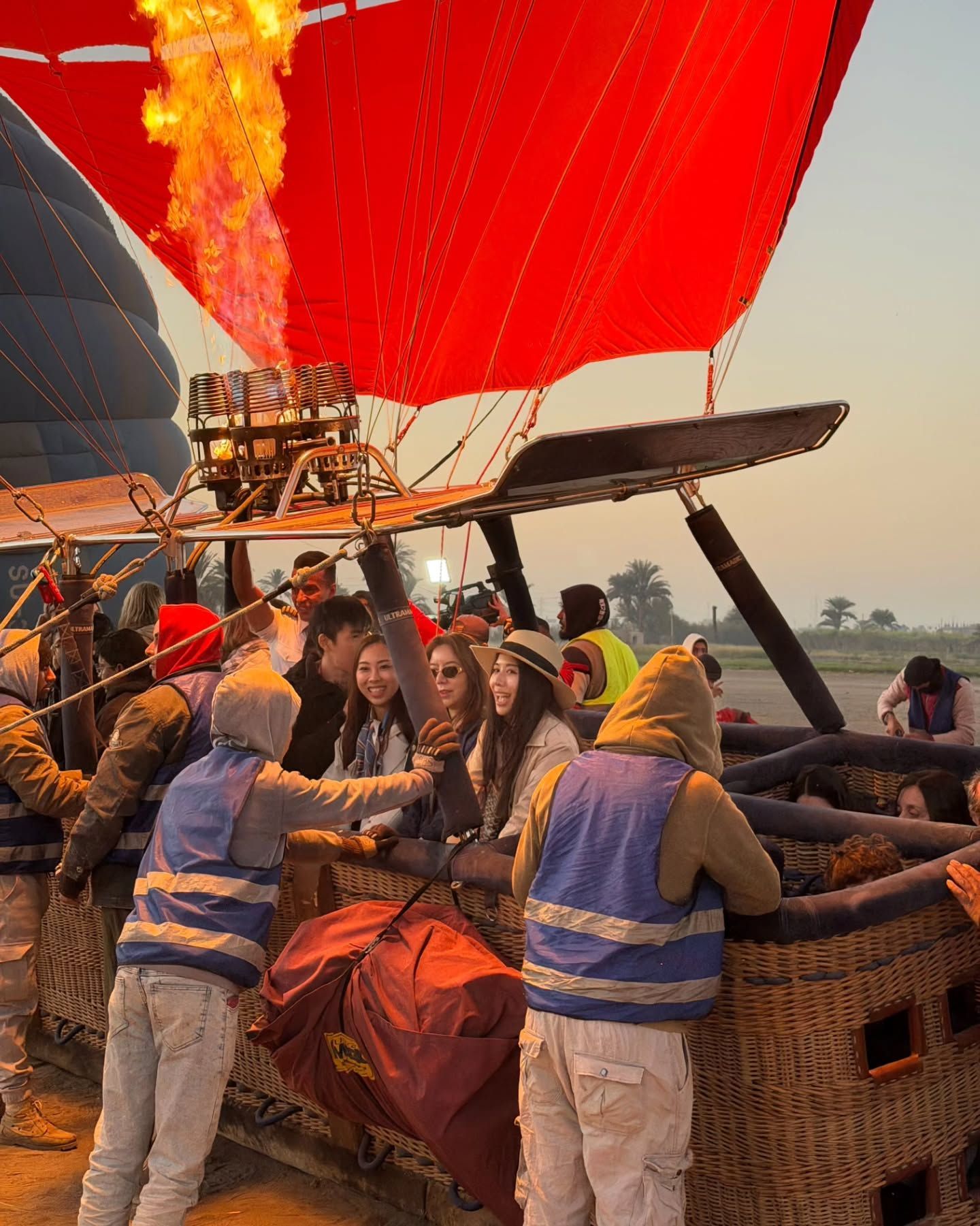 Hot air balloon flying over Luxor countryside