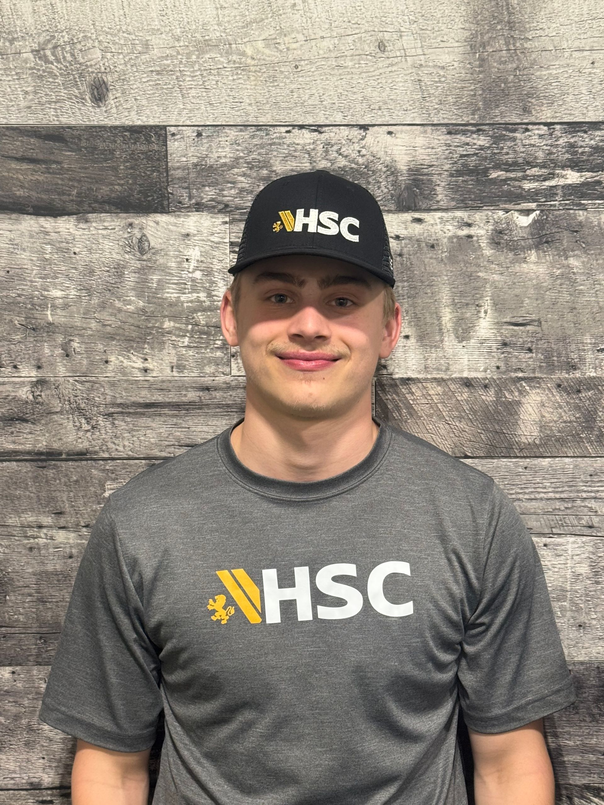 Rykan Baumle Assistant Coach Staff Portrait