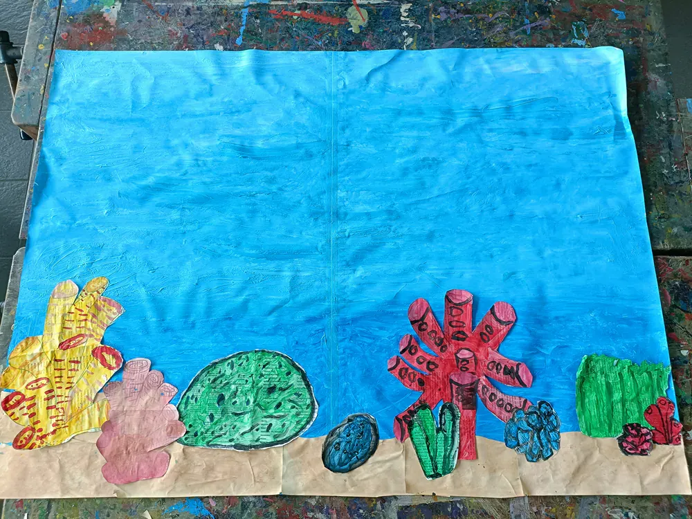 A painting of corals and seashells on a table