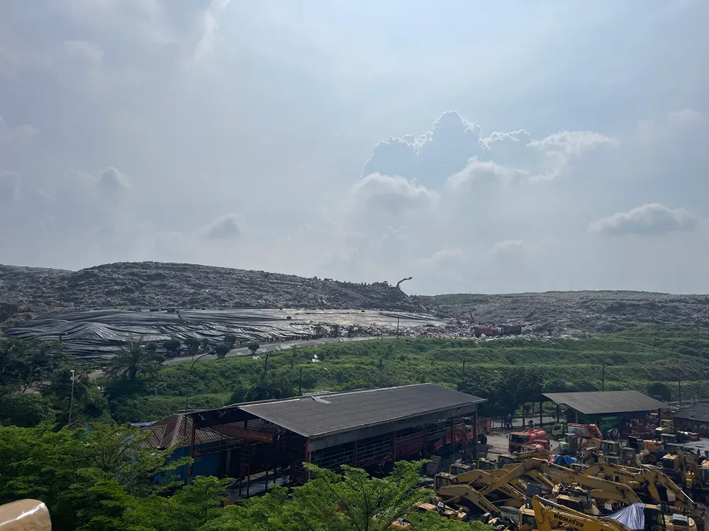 An aerial view of a city with a lot of buildings and trees.