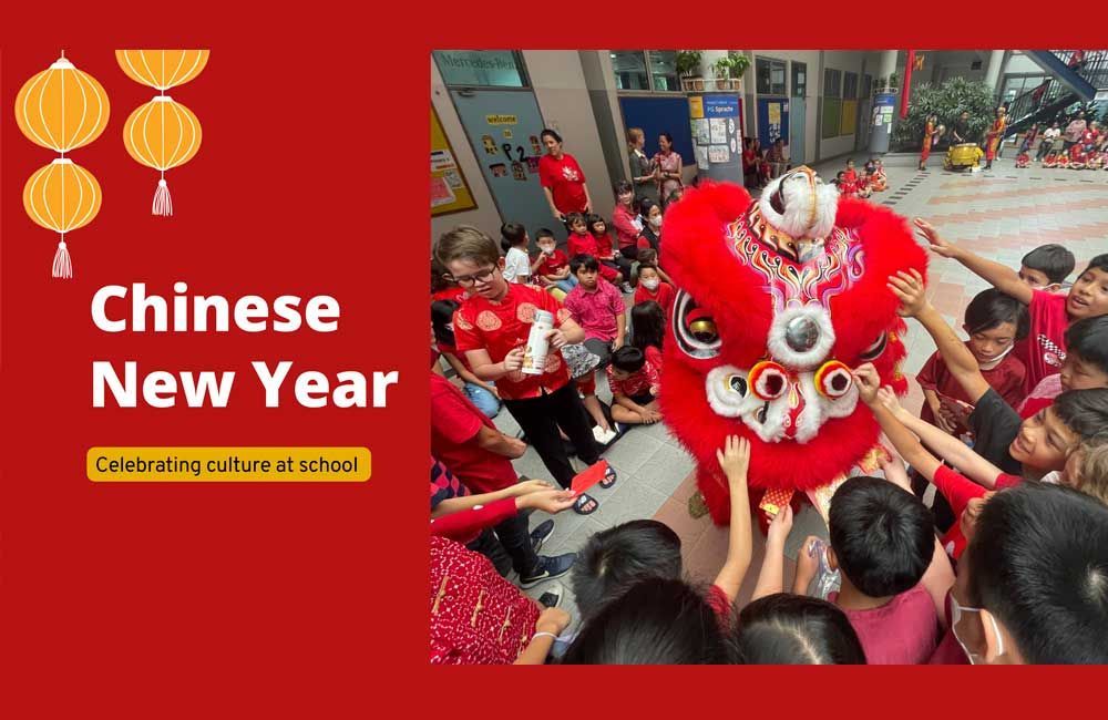 A group of children are celebrating chinese new year with a lion dance.