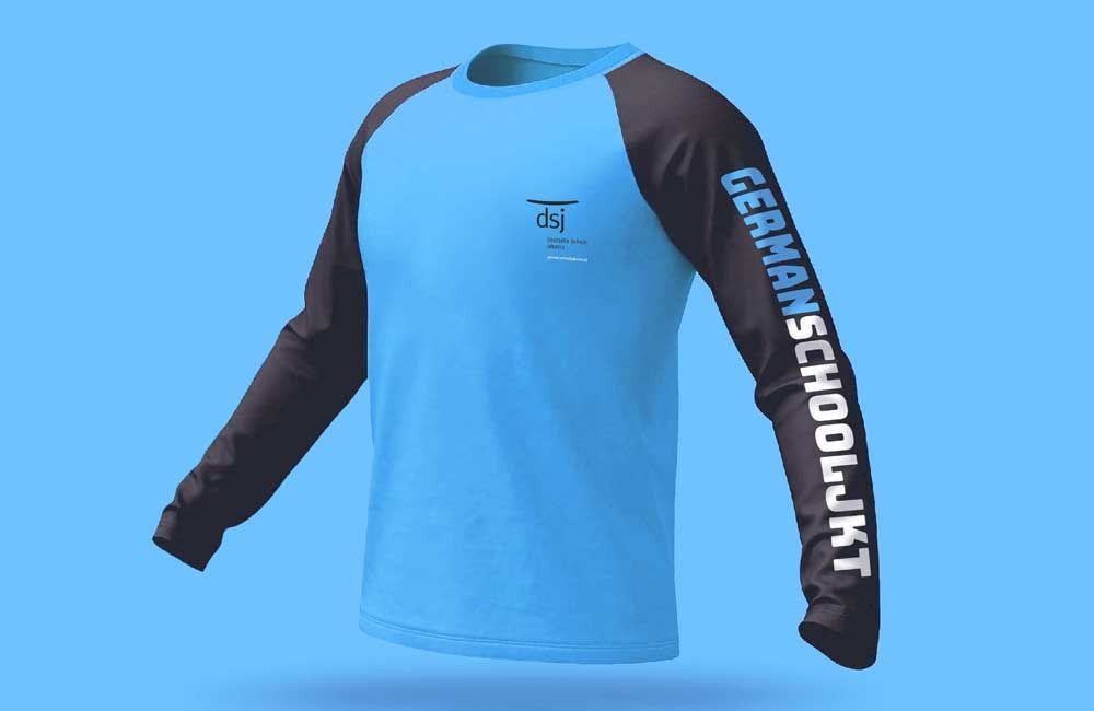 A blue and brown long sleeve shirt with german school written on the sleeve