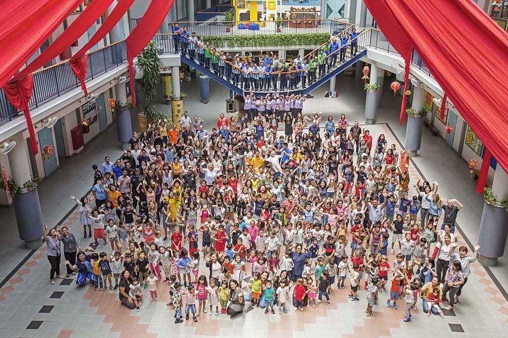 A large group of people are posing for a picture