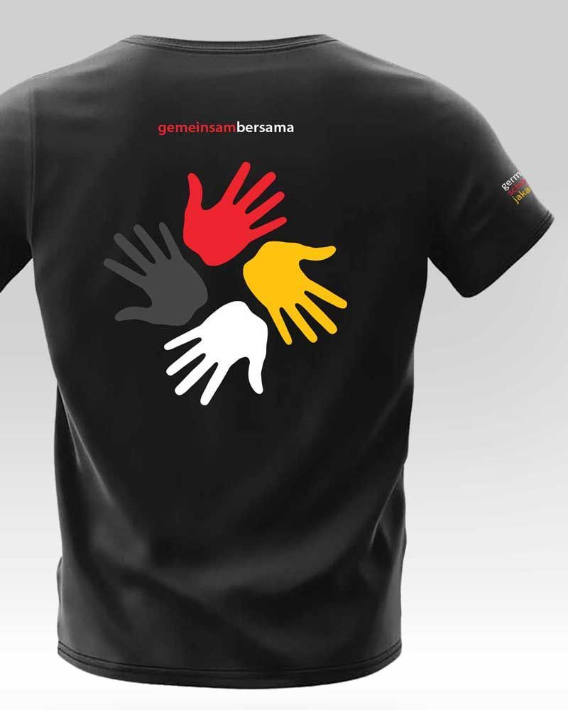 A black t-shirt with a circle of hands on the back