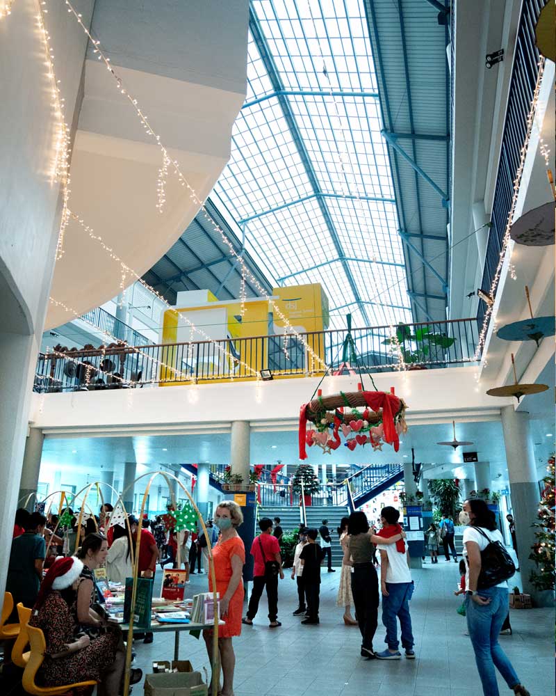 A large building with a lot of people in it