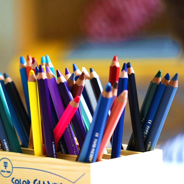 A box of colored pencils has the word color on it