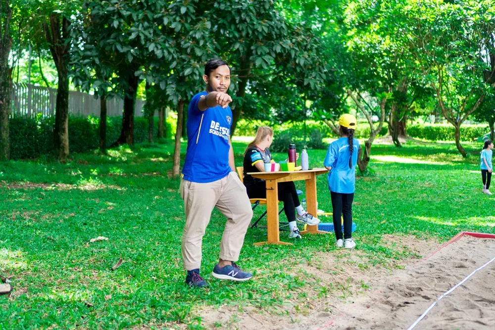 A group of children are playing in a park.