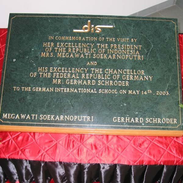 A commemorative plaque honoring the visit of Indonesian President and German Chancellor to the School