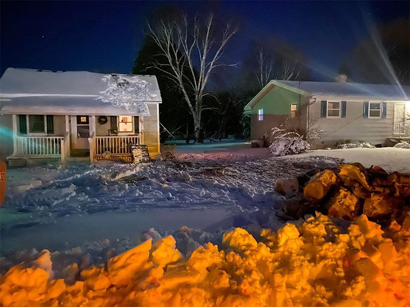 A Bunch Of Firewood On A Snow - Appleton, WI - TREE B GONE