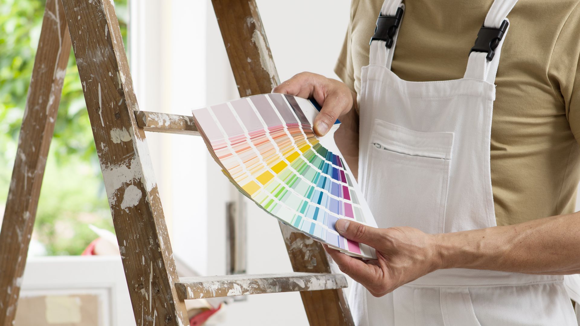 Painter Looking at the Color Swatches