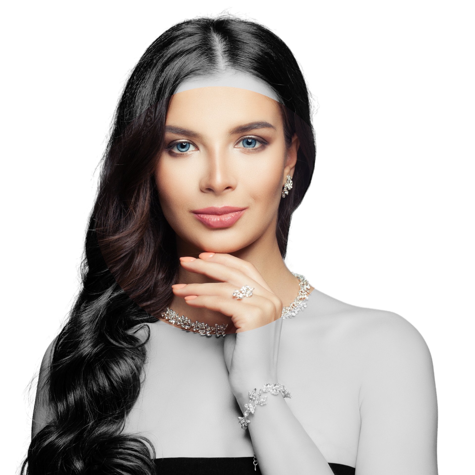 A woman with long black hair is wearing a necklace and a ring.