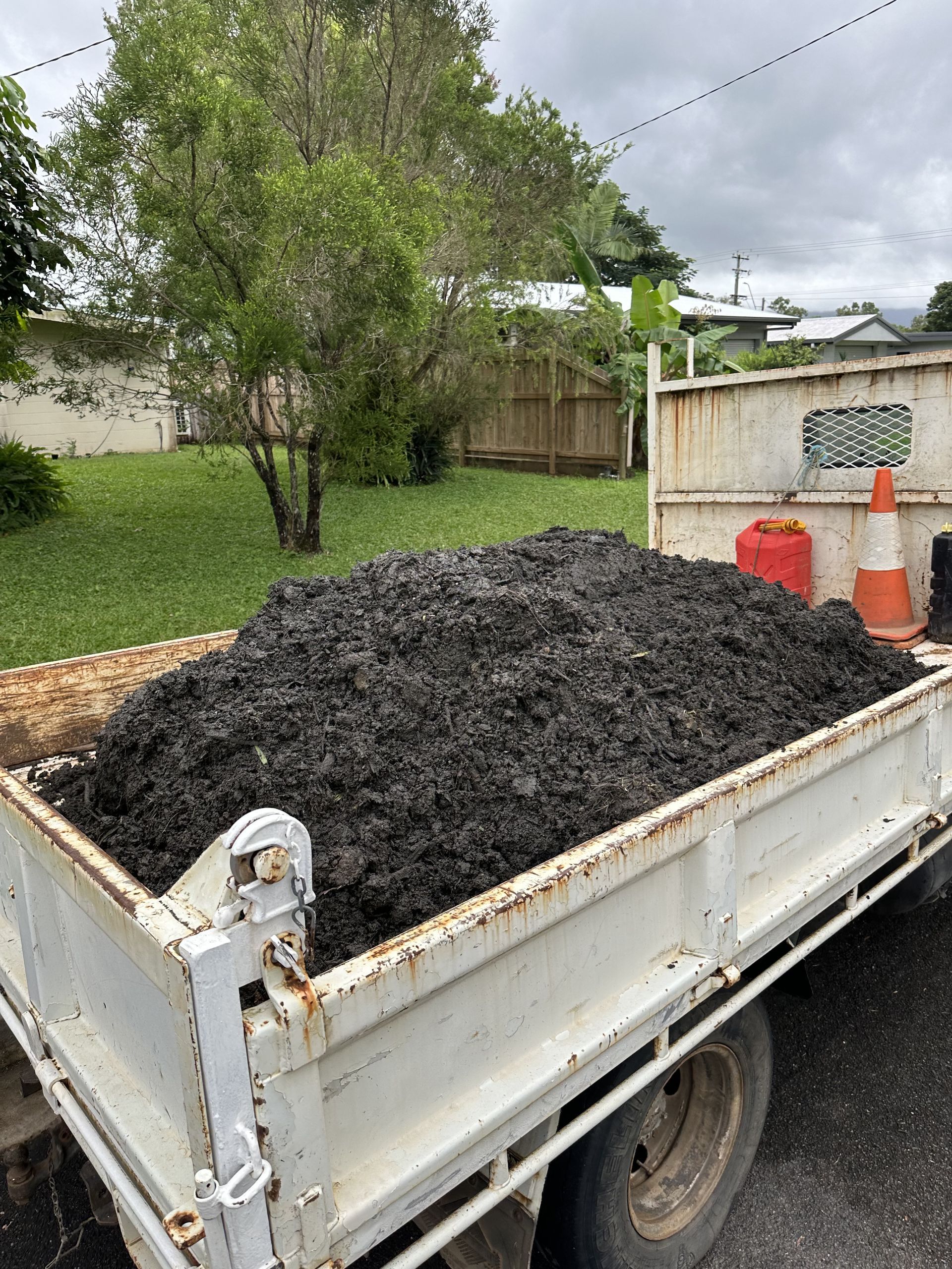 White truck With Dirt in tray — Cairns Earthmoving Solutions In Holloways Beach, QLD