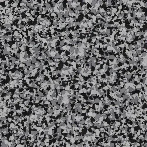 Abstract gray and black speckled pattern filling the frame
