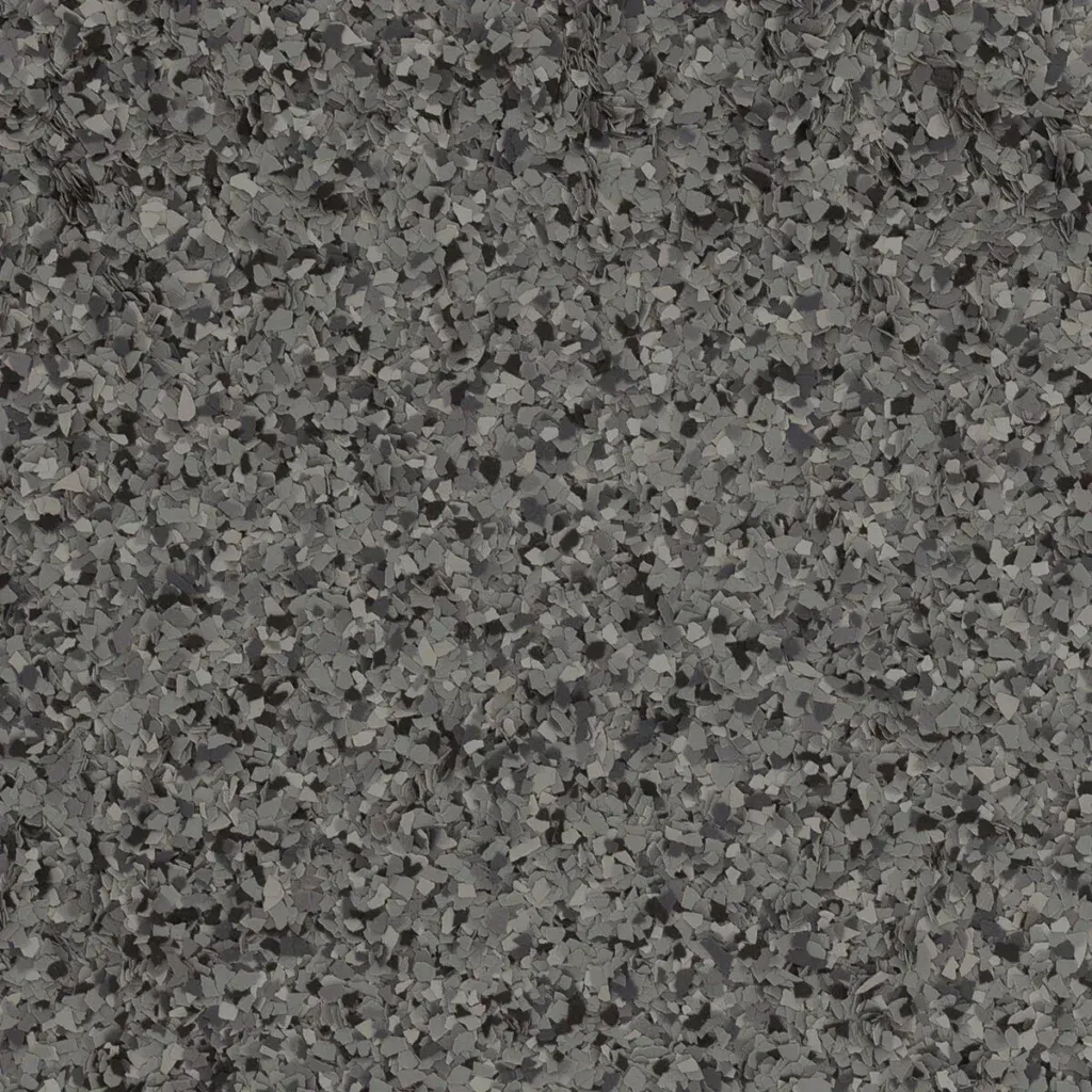 Gray speckled stone or carpet-like texture filling the frame