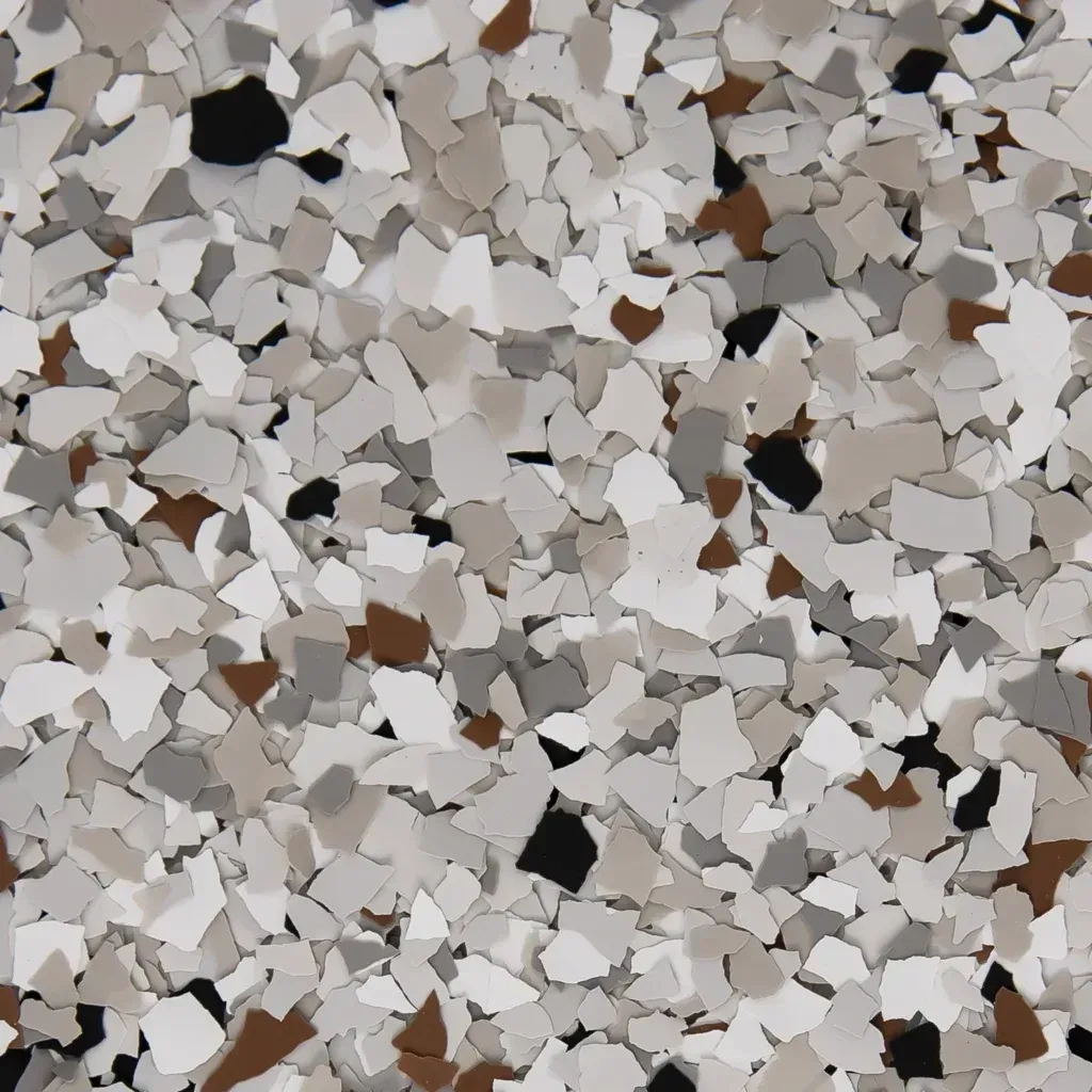 Close-up of a speckled gray, white, and beige stone or terrazzo surface