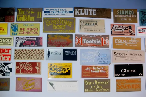 A collection of movie posters including the godfather
