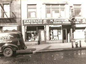 A black and white photo of a Epstein's Paints store