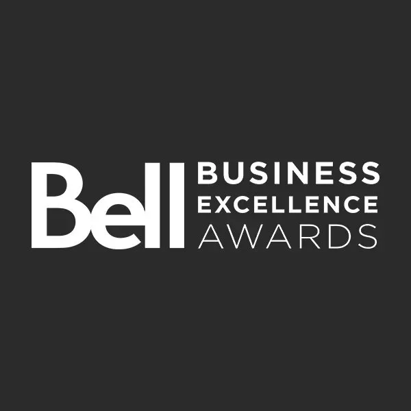 The bell business excellence awards logo on a black background