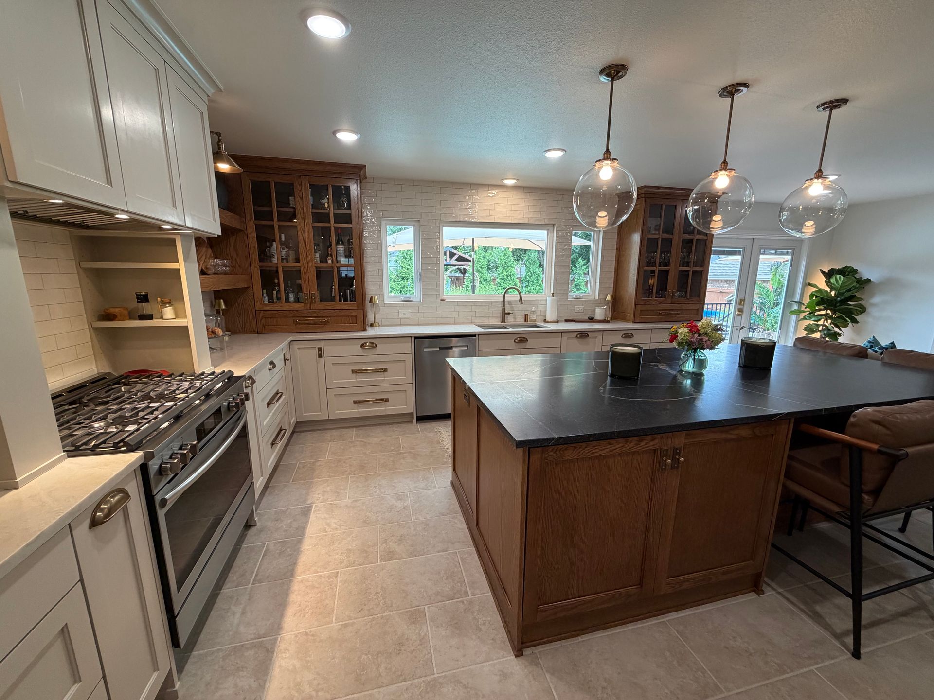 Completed kitchen project showcasing a kitchen island and cabinetry