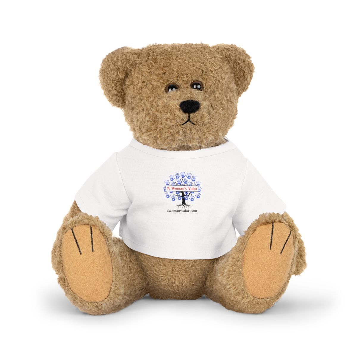 A brown teddy bear sits wearing a white t-shirt featuring a tree graphic.