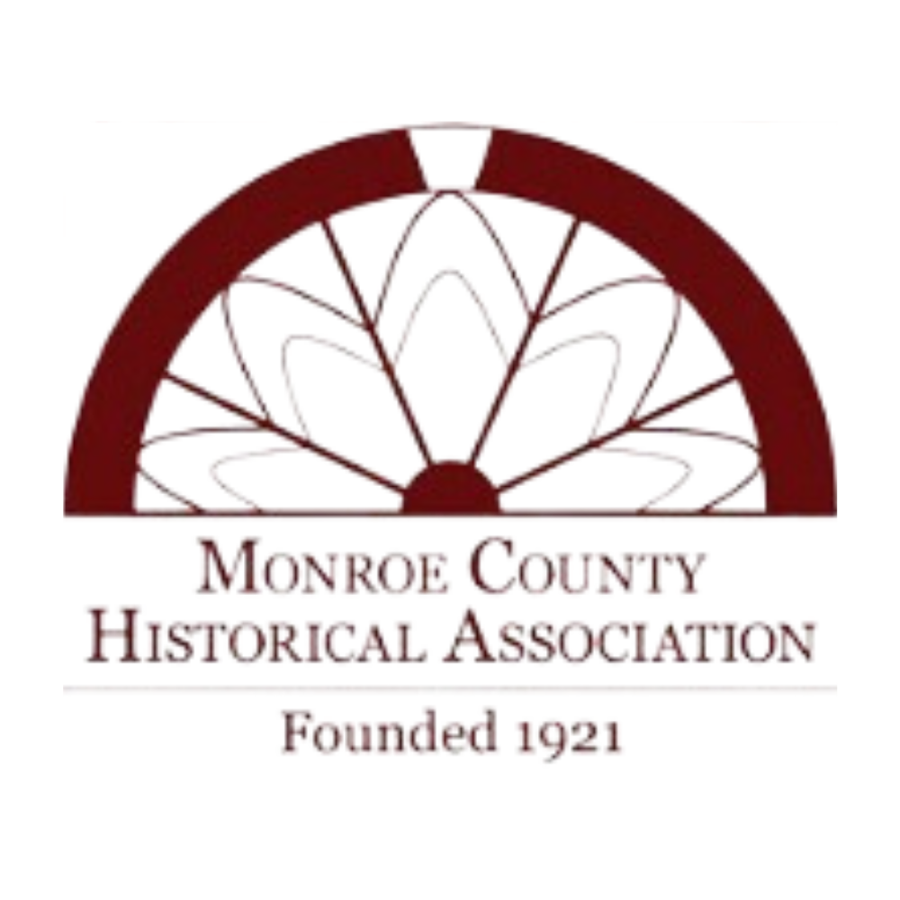 A logo for the monroe county historical association