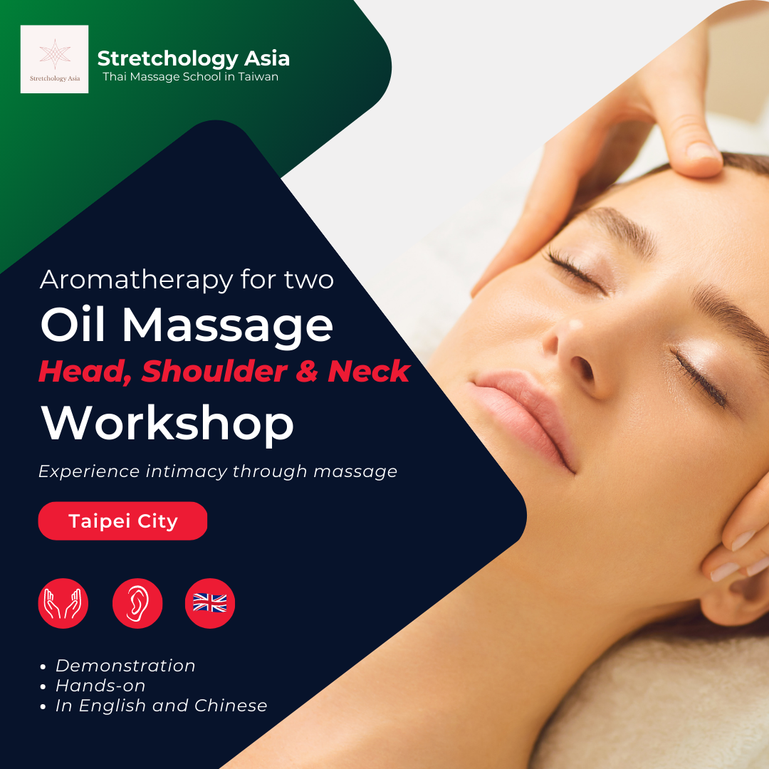 A woman is getting an oil massage on her head , shoulder and neck.