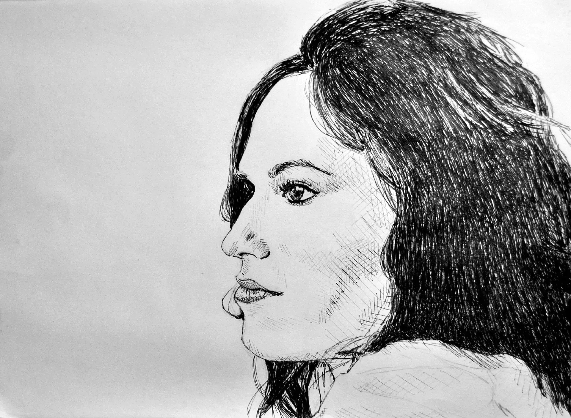 Woman's profile portrait, drawn in black ink with dark, voluminous hair, gazing slightly left.