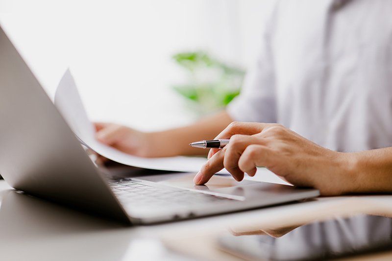 typing on a laptop keyboard