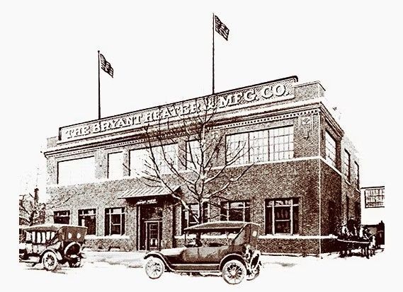 Vintage sepia-toned illustration of a two-story commercial building with parked cars and flags on the roof
