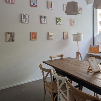 Big wooden table and wall deco.