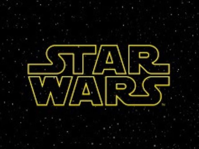 Yellow "STAR WARS" logo on a black background with white star-like dots.