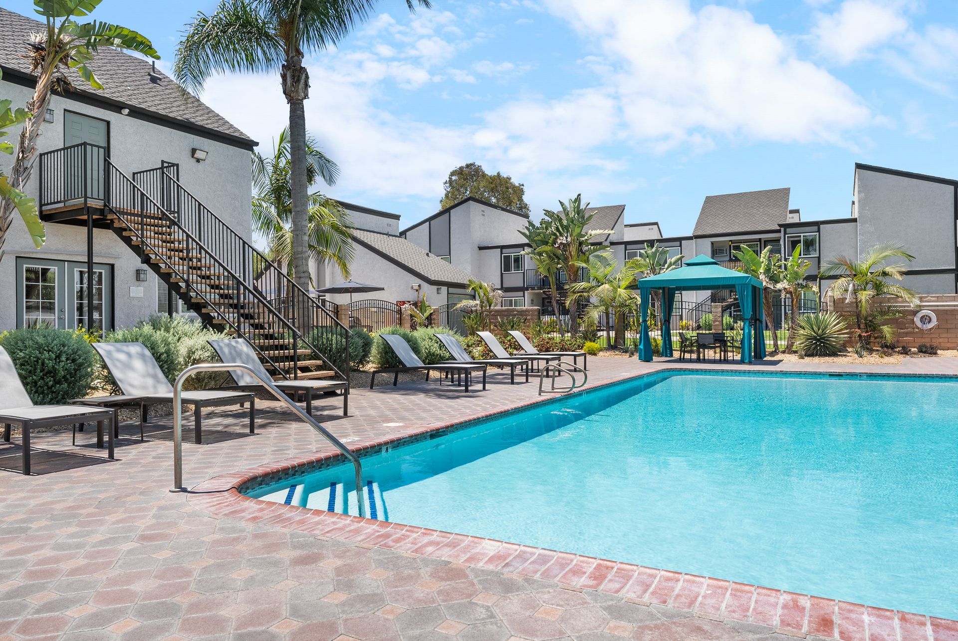 pool with lounge chairs