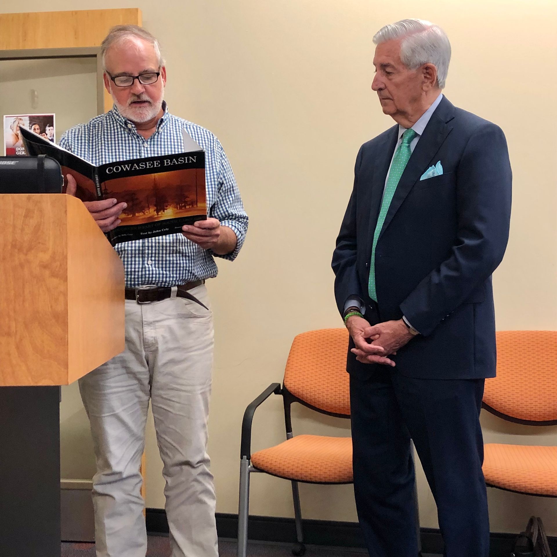 Stuart White - Congaree Land Trust, reads Board Resolution to Senator Nikki Setzler.