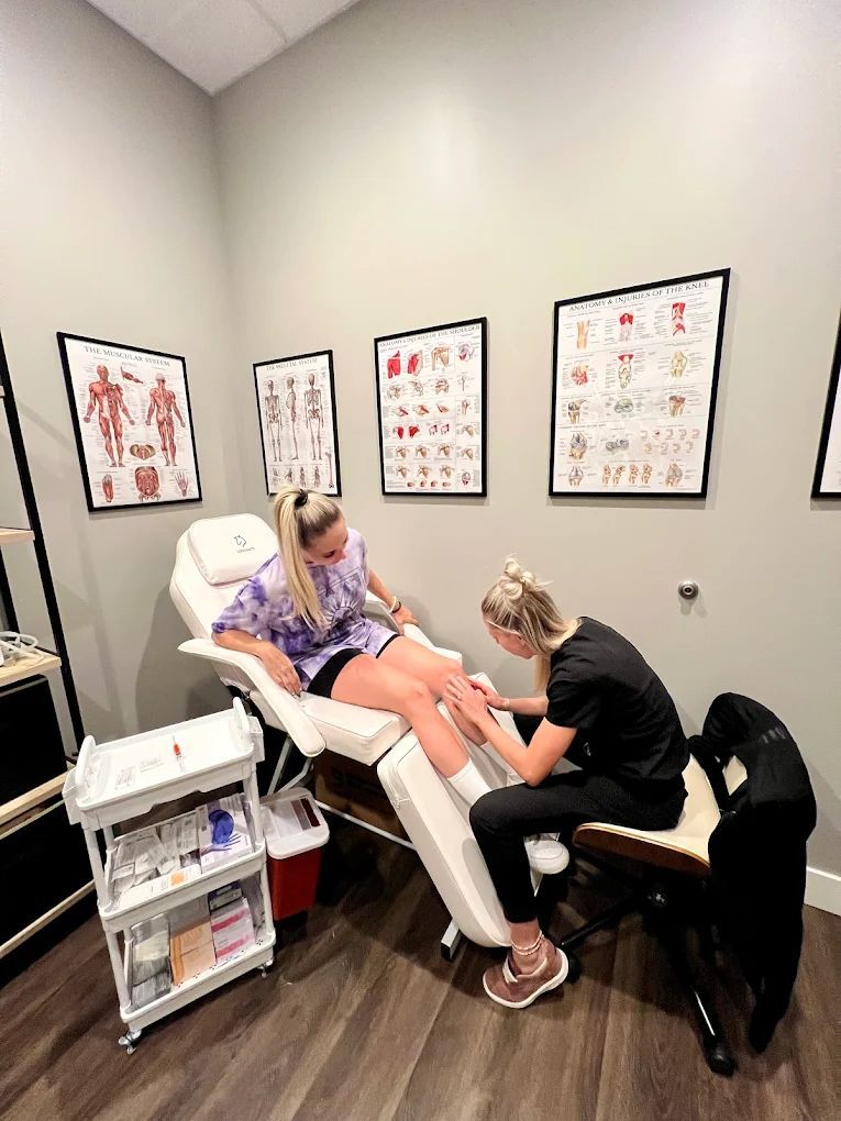 Aubrie Bair, DNP, FNP-BC with a patient.