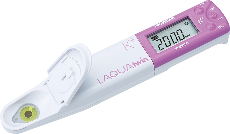 A purple and white thermometer with a digital display that says 2000 on it.