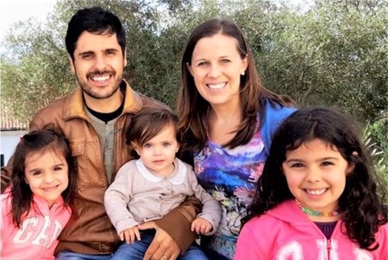 Family of five, parents and three girls.
