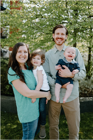 Family of four with two small children.